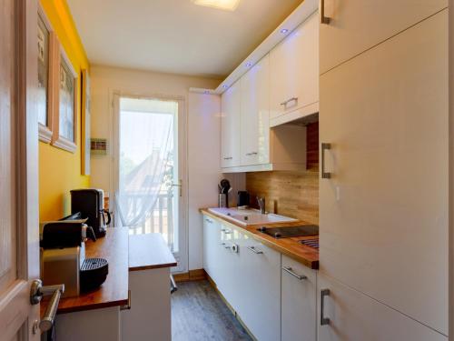 Η κουζίνα ή μικρή κουζίνα στο Apartment Eden Park-2 by Interhome