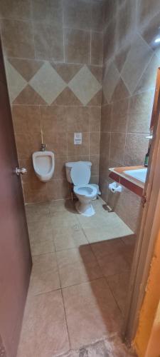 Kylpyhuone majoituspaikassa Hotel Iker