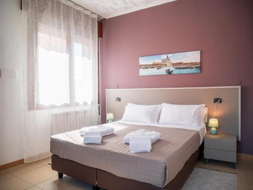 Ένα ή περισσότερα κρεβάτια σε δωμάτιο στο Hotel RB Venice