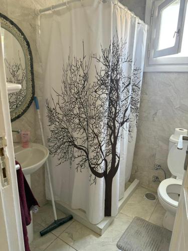 Ένα μπάνιο στο Sidi-Abdelrahman twin house Orchidia 4 bedrooms