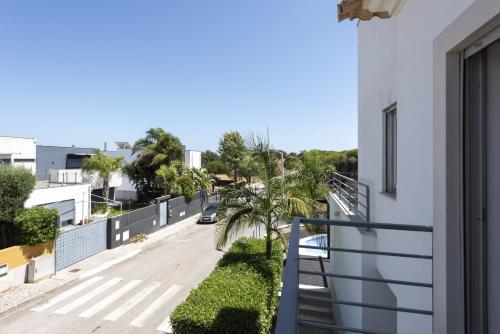 a balcony with a view of a street at Villa da Ria - by HD Properties in Monte Negro