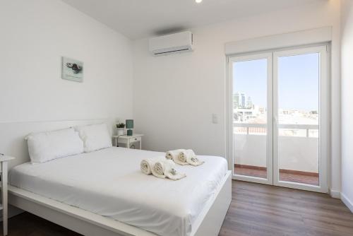 Foto Garret - Faro Apartment by HD 2