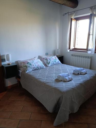 Ένα ή περισσότερα κρεβάτια σε δωμάτιο στο Casa Ca I Locca