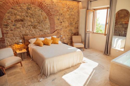 Postel nebo postele na pokoji v ubytování Agriturismo Il Serraglio