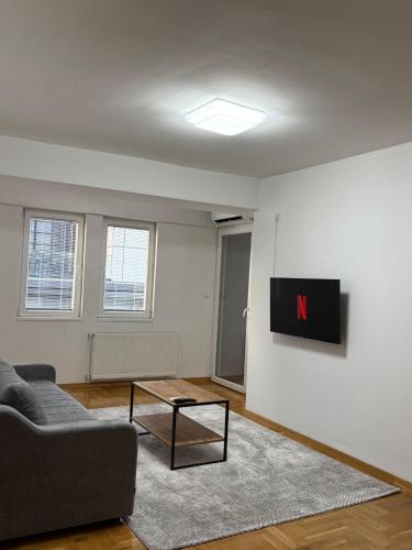 Center Apartment-Modern,FamilyHeaven,Bus Stationにあるテレビまたはエンターテインメントセンター