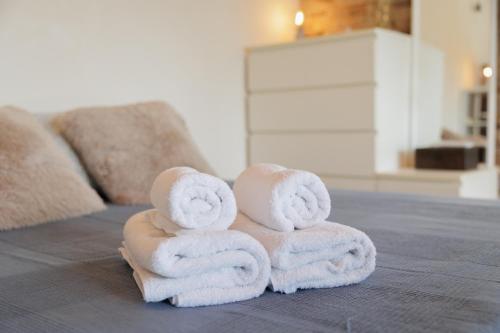 Postel nebo postele na pokoji v ubytování CIM Apartments