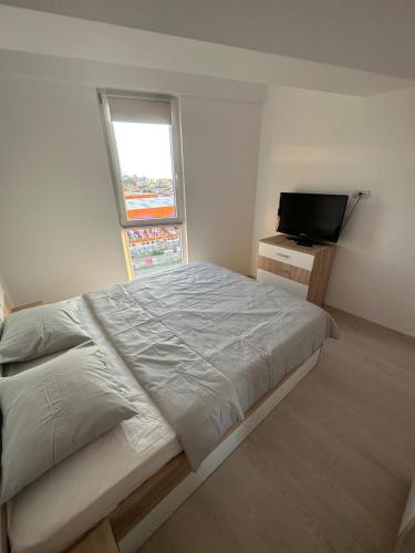 Ένα ή περισσότερα κρεβάτια σε δωμάτιο στο Suba's Apartment