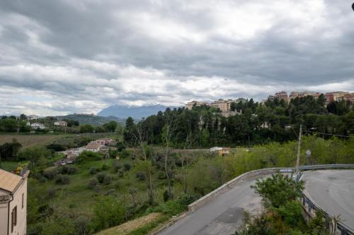 a view of a road in a city with buildings at Tra mare e monti in Chieti