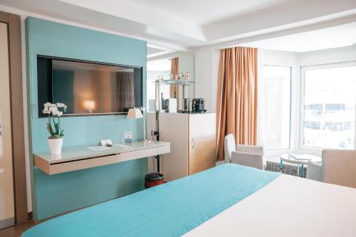 Ein Bett oder Betten in einem Zimmer der Unterkunft Port Palace