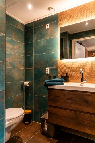 Koupelna v ubytování B&B de Gouwe Tijd, suite "Gouden Ginkgo"