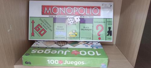 a monopoly box sitting on top of a table at Apartalux San Pedro Mar in San Pedro del Pinatar
