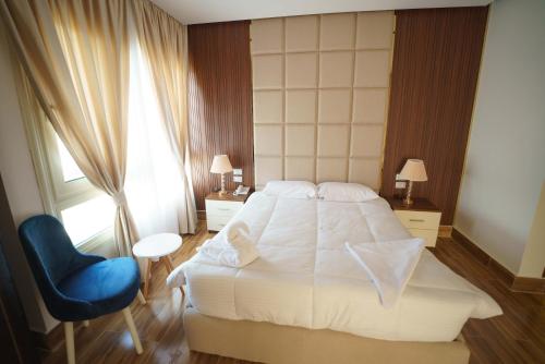 Ένα ή περισσότερα κρεβάτια σε δωμάτιο στο SOLAYA Sunshine inn