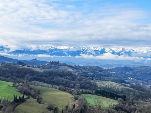 a view of a mountain range with snow covered mountains at Apartment Purin I by Interhome in Murazzano