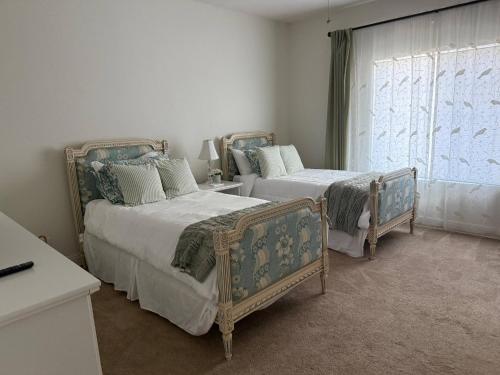 Ένα ή περισσότερα κρεβάτια σε δωμάτιο στο Serene Oasis Getaway w/Heated Pool+Outdoor Space!