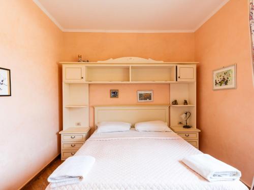 Ένα ή περισσότερα κρεβάτια σε δωμάτιο στο Apartment Pineland app Garden by Interhome