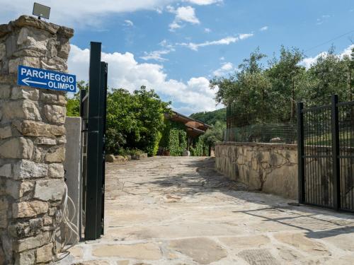 a gate to a house with a sign on it at Apartment Bomba vista lago 8 by Interhome in Villa Santa Maria