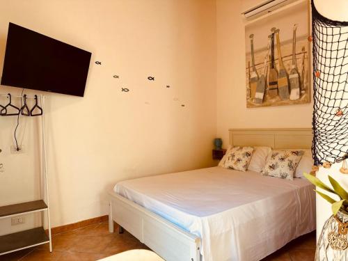 Ένα ή περισσότερα κρεβάτια σε δωμάτιο στο Villa Tiche