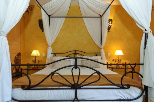 Un ou plusieurs lits dans un hébergement de l'établissement Hôtel CASITA