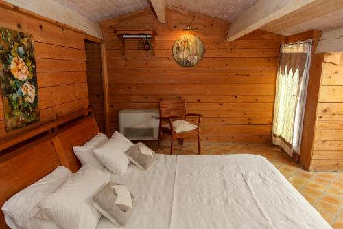 Un ou plusieurs lits dans un hébergement de l'établissement Hôtel CASITA