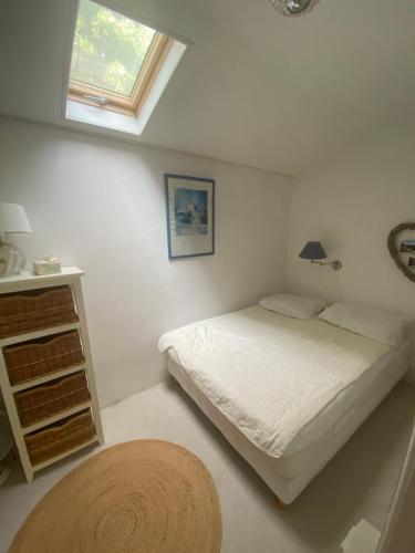 En eller flere senge i et værelse på La félicité