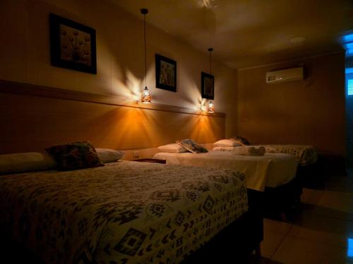 Ένα ή περισσότερα κρεβάτια σε δωμάτιο στο Hotel Classic VIP