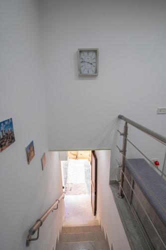 Ένα ή περισσότερα κρεβάτια σε δωμάτιο στο Casa ITRIA 15