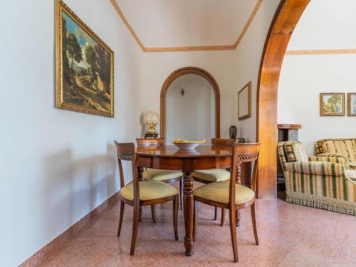 a dining room with a table and chairs at Apartment Roseto Down Town by Interhome in Roseto degli Abruzzi