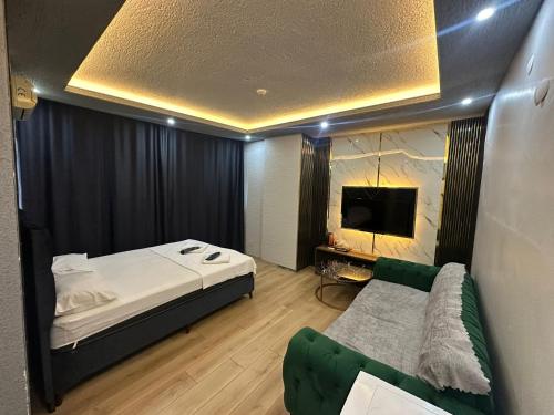Ένα ή περισσότερα κρεβάτια σε δωμάτιο στο Vip Suit Otel
