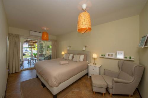 Cama ou camas em um quarto em Tropical Garden Escape at Masbango - Jan Thiel