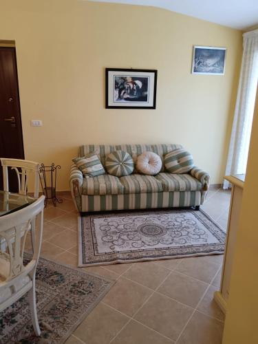 Ruang duduk di Mansarda con Terrazzo a Canicattì