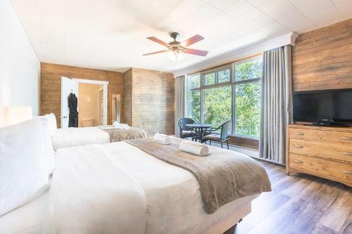 Una cama o camas en una habitación de Auberge des Berges