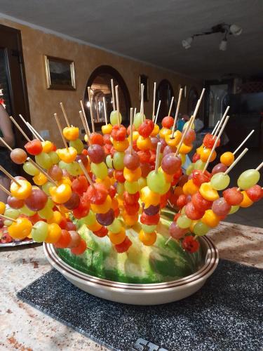 a large bowl of fruit on a table at Bed and Breakfast Il Sogno Sardo in Pimentel