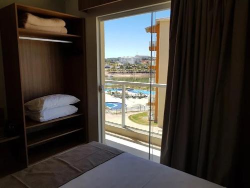 Postel nebo postele na pokoji v ubytování Ihas do Lago