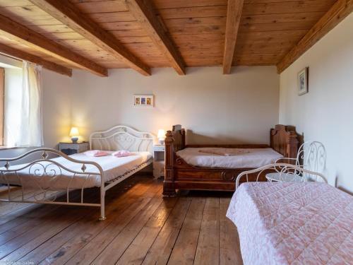 Postel nebo postele na pokoji v ubytování Grande maison rénovée avec WIFI, idéale pour familles - FR-1-583-406