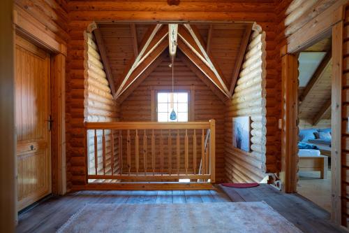 Ein Bett oder Betten in einem Zimmer der Unterkunft Das Josef - Idyllisches Blockhaus, barrierefrei, zwischen den Seen