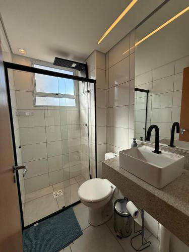 Ένα μπάνιο στο New Apartment in Lagoa Santa