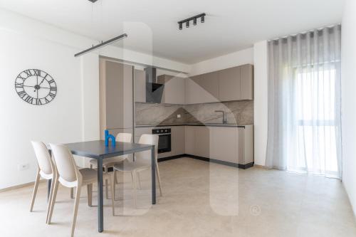 Η κουζίνα ή μικρή κουζίνα στο Homiday - Case Vacanza Elea