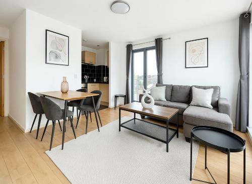 a living room with a couch and a table at Premium 2 Bed Flat near Colindale Station in Colindale