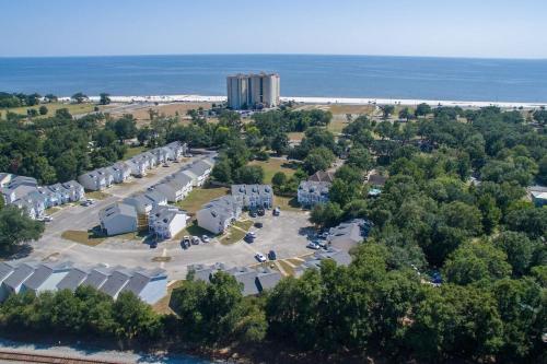 an aerial view of a resort with the beach at Gorgeous 3 bedroom townhome Walk to the beach in Gulfport