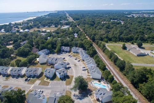 an aerial view of a parking lot near the water at Gorgeous 3 bedroom townhome Walk to the beach in Gulfport