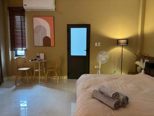 En eller flere senge i et værelse på 601 Đình Thôn