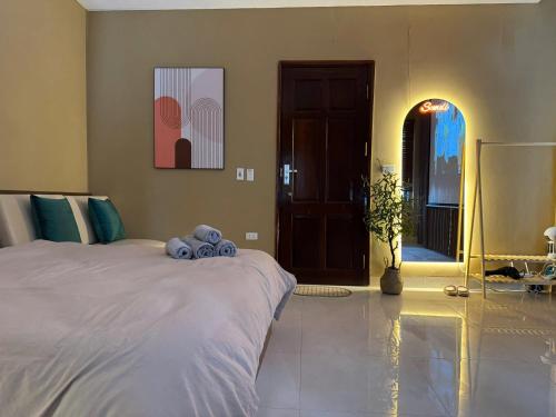 En eller flere senge i et værelse på 601 Đình Thôn