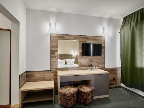 TV a/nebo společenská místnost v ubytování Hotel Opal