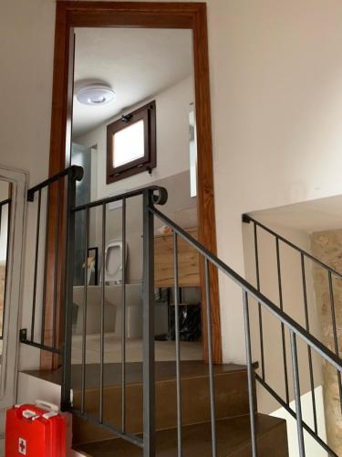 a view of the stairs from the second floor at Dommu Montes e Mare in Baunei