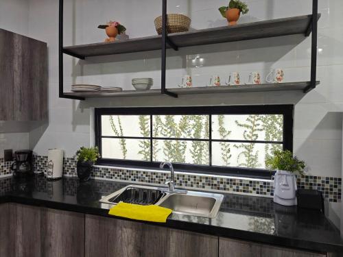 Kuchyň nebo kuchyňský kout v ubytování Casa Moreno Deluxe