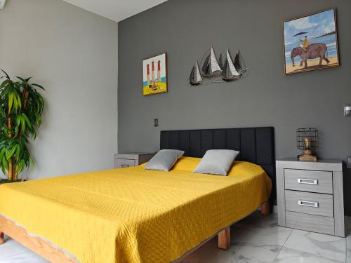 Postel nebo postele na pokoji v ubytování Casa Moreno Deluxe