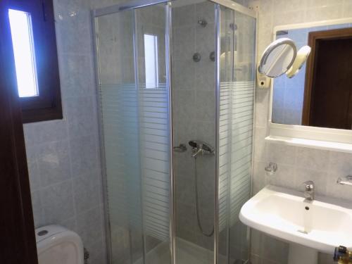 Ванная комната в Hotel Makednos
