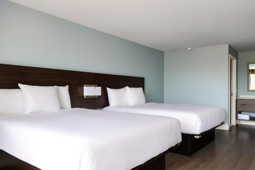 Katil atau katil-katil dalam bilik di Florence Inn and Suites