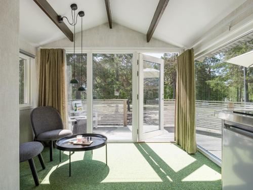 Posezení v ubytování Holiday Home Hölick Minichalet 1 by Interhome