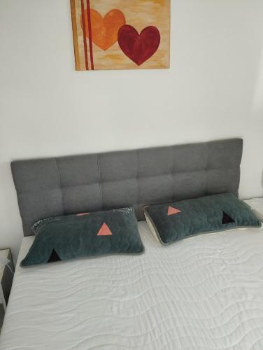 Ένα ή περισσότερα κρεβάτια σε δωμάτιο στο Apartman Ľudmila